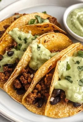 Crispy Baked Ground Turkey Tacos with Avocado Sauce