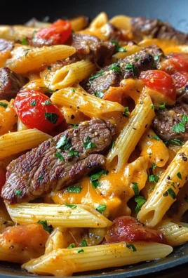 One Skillet Spicy Cajun Cheddar Steak Pasta