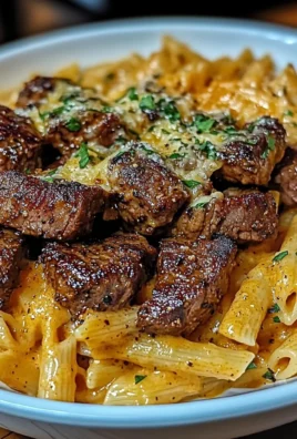 Indulgent Cajun Steak Tips with Cheesy Penne Parmesan Sauce