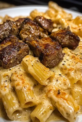 Cajun Garlic Butter Beef with Creamy Velveeta Rigatoni