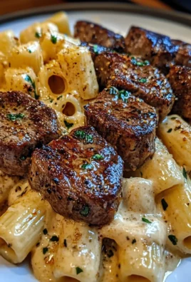 Cajun Garlic Butter Steak Bites with Creamy Three-Cheese Rigatoni