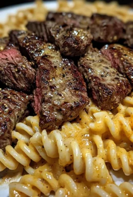 Garlic Butter Steak Tips with Cheesy Rotini in Cheddar Sauce