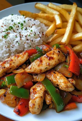 Spicy Chicken Stir-Fry with Bell Peppers, Rice & Fries