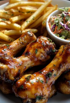 Ultimate Sticky Garlic Chicken Drumsticks with Crispy Fries & Creamy Slaw